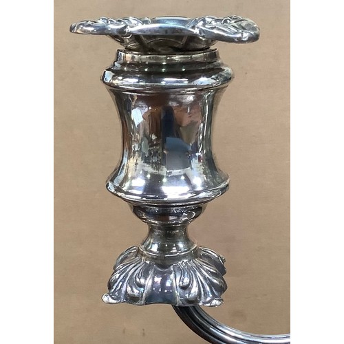 108 - A matching silver candelabrum suite by Walker & Hall, comprising three-light candelabrum and two can... 