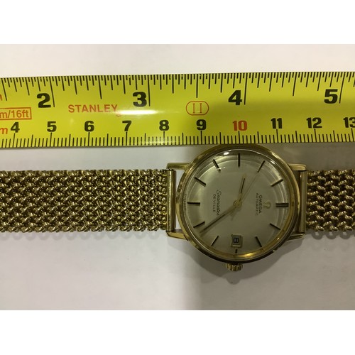 174 - A gents 9ct gold cased Omega Seamaster De Ville automatic wristwatch, the silvered dial with applied... 