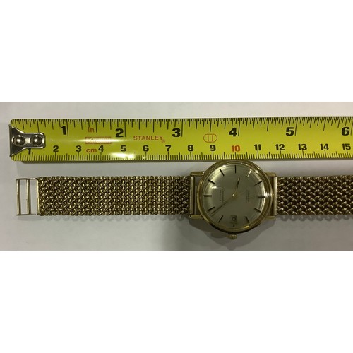 174 - A gents 9ct gold cased Omega Seamaster De Ville automatic wristwatch, the silvered dial with applied... 