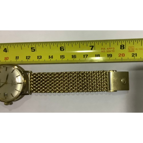 174 - A gents 9ct gold cased Omega Seamaster De Ville automatic wristwatch, the silvered dial with applied... 