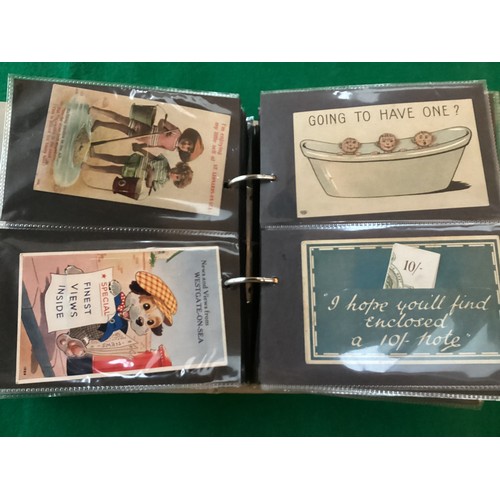 255 - A small modern album containing approximately 130 standard-size novelty cards, including a woven in ... 