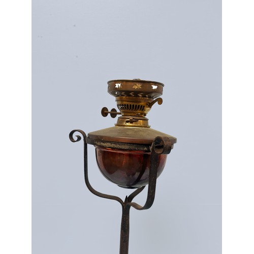 400 - Two various Arts & Crafts style wrought iron oil lamp stand converted to electric, with adjustable s... 