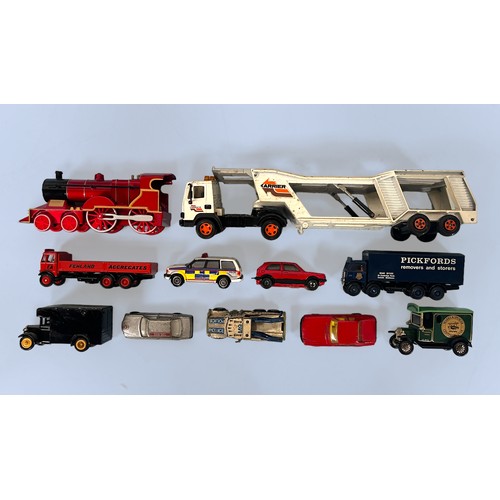 363 - Eighteen assorted boxed die-cast scale model vehicles, comprising, a Burago 1/32 2011 Red Bull Racin... 