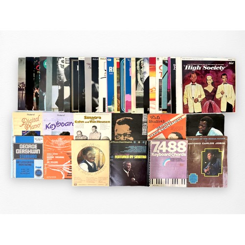 418 - A collection of thirty-four assorted 12” vinyl LPs, compilations and soundtrack records, to include,... 