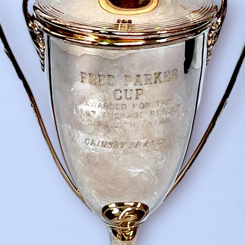 78 - A silver two handled trophy with cover, probably by Henry Williamson Ltd, with inscription, raised o... 