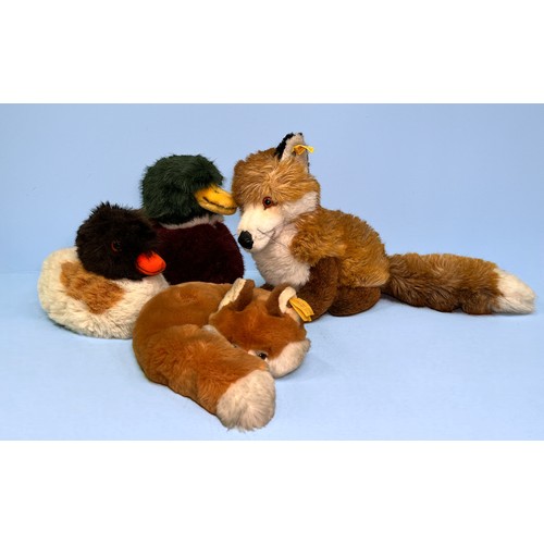 373 - Four various Steiff teddy bears, modelled as foxes and ducks, comprising, ‘Junior Fuzzy Stuffed Fox’... 