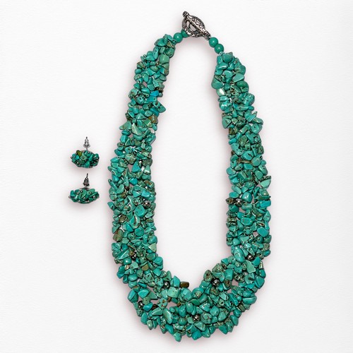 133 - A turquoise necklace formed of multiple pebbles of naturalistic form, with white metal clasp, togeth... 