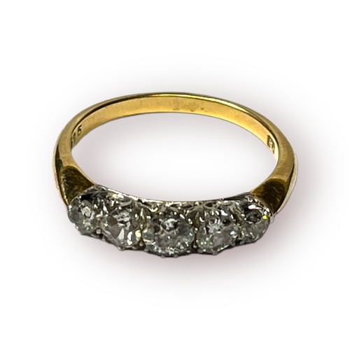 129 - An 18ct yellow gold ring, claw set with five graduated Victorian cut diamonds, total estimated diamo... 