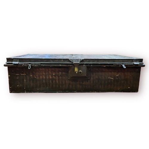 299 - An early 20th century black painted metal military trunk with twin handles, mounted lock to front an... 