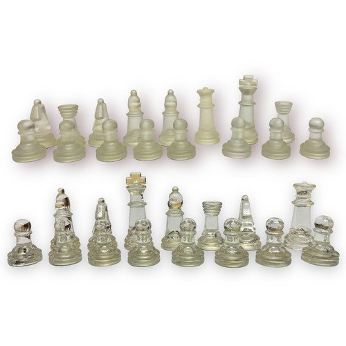 301 - Two glass chess sets, with glass board and a wooden Staunton pattern chess set, together with two wo... 