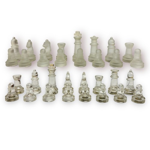 301 - Two glass chess sets, with glass board and a wooden Staunton pattern chess set, together with two wo... 