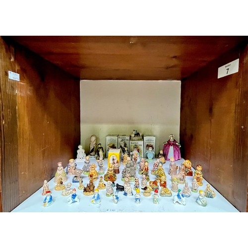 21 - A collection of fifty-two assorted Wade and Wade Ireland ceramic figures, to include, 18/20 large ‘N... 