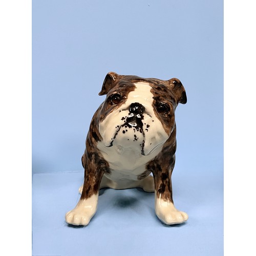 24 - Two large Jenny Winstanley pottery figures of dogs, a French bulldog and a pug, with factory marks t... 