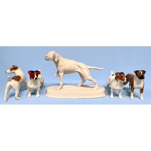 26 - Five Beswick pottery figural dogs including an unpainted, matt Pointer, three Jack Russell Terriers ... 