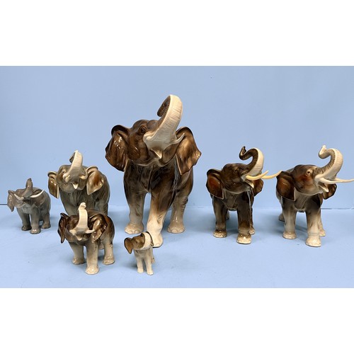 32 - A collection of seven Royal Dux pottery figures of elephants, each with factory marks to bases, larg... 