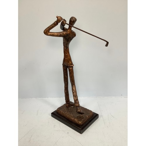 466 - A stylised bronze sculpture of a golfer at full swing, signed ‘Kim Y.J.’ to base, approx. 37cm tall