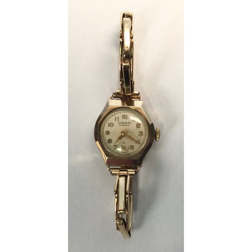 115 - A ladies 9ct gold Cara wristwatch, the silvered dial with Arabic numerals denoting hours and subsidi... 