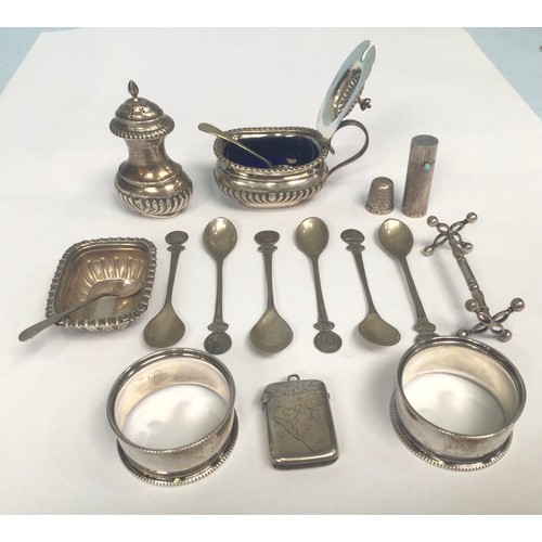 82 - A small collection of assorted silver items comprising a set of six small .800 grade spoons, a vesta... 