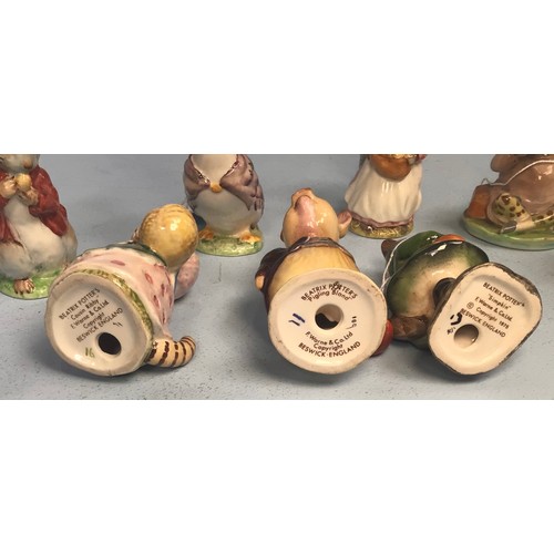 41 - Eight assorted Beswick Beatrix Potter figures including ‘Mr Jeremy Fisher’, ‘Goody Tiptoes’, ‘Jemima... 