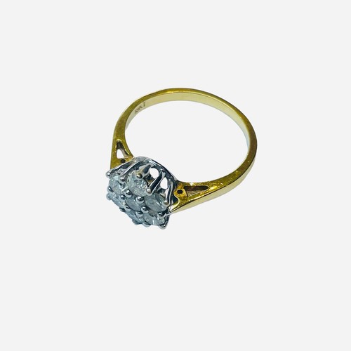 141 - An 18ct yellow gold dress ring, set with 7 x round diamonds in a cluster design, total diamond weigh... 