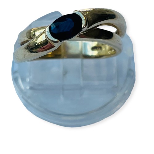 161 - WITHDRAWN: A 14ct yellow gold dress ring, set with an oval faceted sapphire to the centre, in a doub... 