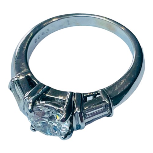 139 - A ladies 18ct white gold ring, claw set with a central round brilliant cut LAB grown diamond, weighi... 