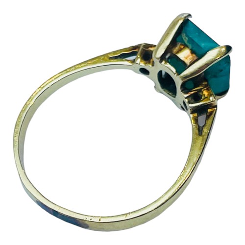 142 - A 14ct yellow gold dress ring, claw set with a square shaped emerald, estimated weight 1.50cts, ring... 
