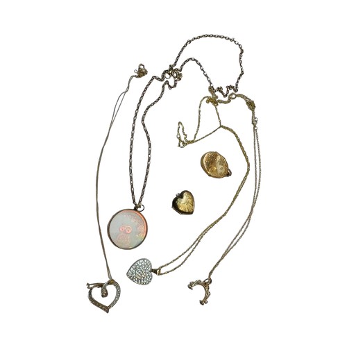 157 - Three various 9ct gold pendants and chains, and a broken pendant on chain, together with a 9ct gold ... 