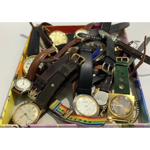 122 - A collection of assorted gents and ladies wristwatches comprising an 18ct gold cased ladies watch on... 