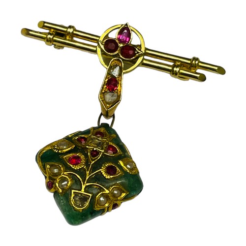147 - A yellow gold bar and jade pendant brooch, set with 3 x Burmese rubies to the centre of the double b... 