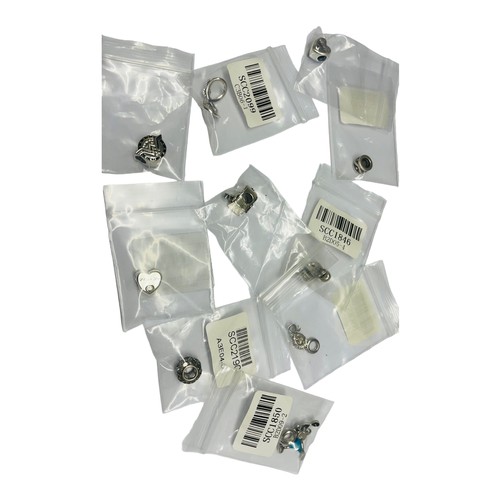 193 - Ten various new silver Pandora charms, including G of T charm, a 'thank you' charm, and a 'missed yo... 