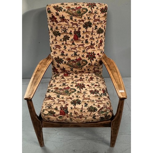 509 - A mid 20th century Parker Knoll teak framed lounge / armchair, bungee seat support, re-upholstered i... 