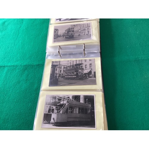 284 - An album containing 104 postcard-size tram photographs – some on postcard-style card. This lot compr... 