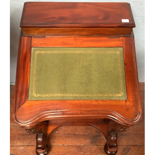 513 - A reproduction Victorian style mahogany Davenport, of typical form, with hinged, raised back enclosi... 