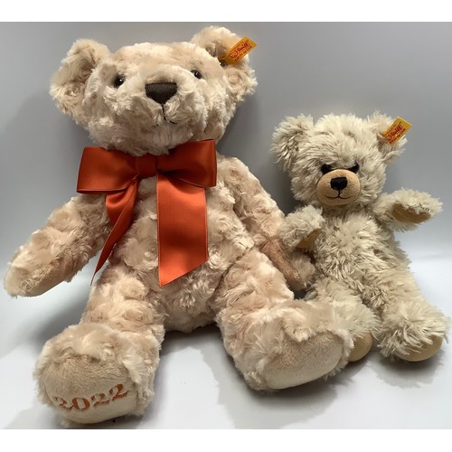 54 - A 2022 Steiff bear with tied ribbon scarf, 35cm, and a smaller Steiff bear with bean-bag filling, 25... 