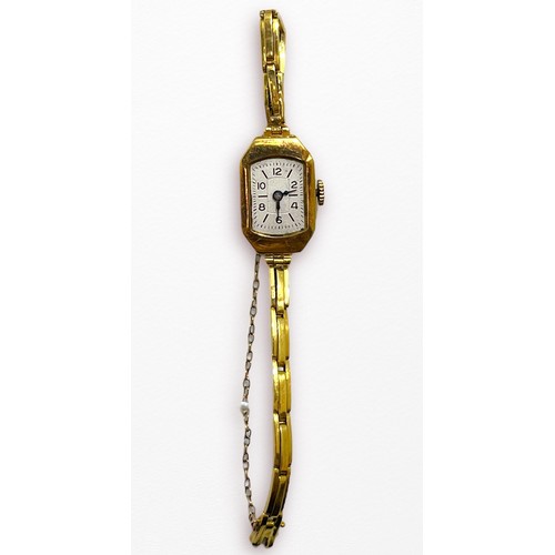 120 - An 18ct gold cased ladies wristwatch, the silvered dial with batons and Arabic numerals denoting hou... 