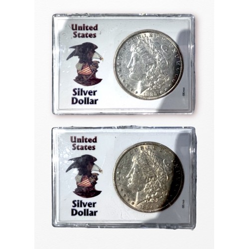 235 - USA:  Three One Ounce Fine Silver Dollars: 2003 (2) and 2004, Four Morgan Dollars: 1884, 1885, 1888 ... 