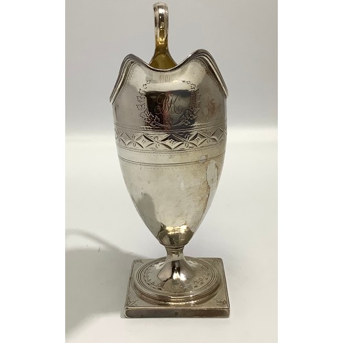 96 - A George III silver small ewer by Duncan Urquhart & Naphtali Hart, with gilt interior, raised on squ... 