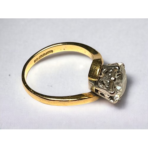 150 - An 18ct yellow gold solitaire diamond ring, the round brilliant cut diamond estimated 2.50cts, I col... 