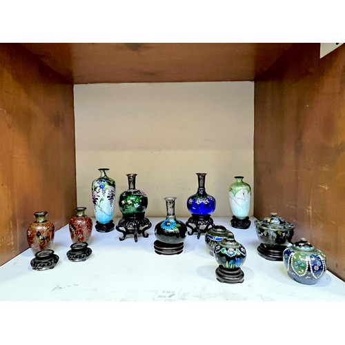62 - A collection of 10 pieces of Chinese cloisonne ware, including three small globular vases with white... 