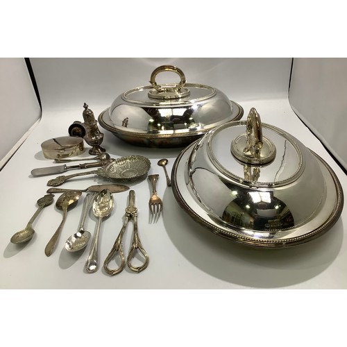 103 - A small collection of assorted silver comprising a pepper caster, a white metal, probably silver win... 