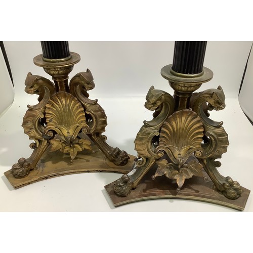 84 - A pair of early 20th Century Elkington Baroque style table lamps, modelled as fluted black columns t... 