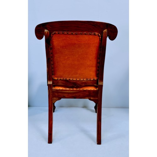 517 - An early Victorian mahogany carver chair, red leather upholstery with metal stud detailing to gimp, ... 