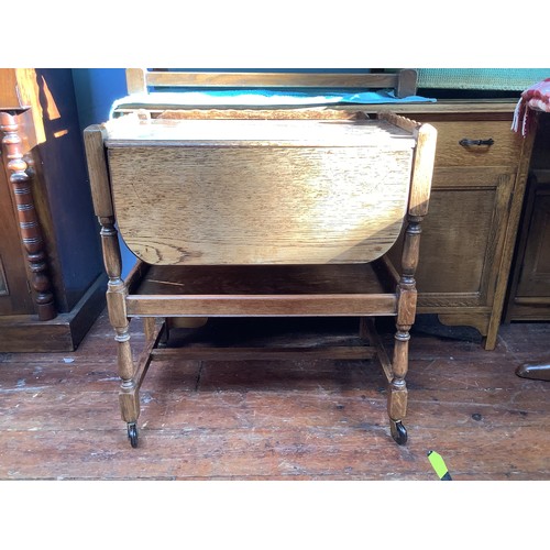 514 - An Ercol Golden Dawn 'Crendance Cupboard'  and matching 'Waterfall Bookcase' together with an oak tw... 