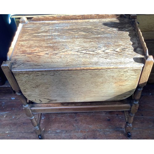 514 - An Ercol Golden Dawn 'Crendance Cupboard'  and matching 'Waterfall Bookcase' together with an oak tw... 