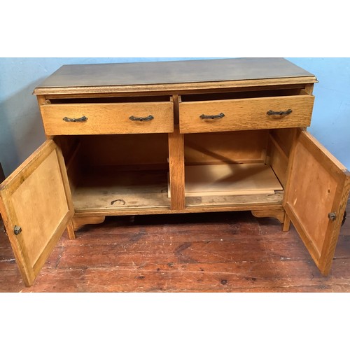 514 - An Ercol Golden Dawn 'Crendance Cupboard'  and matching 'Waterfall Bookcase' together with an oak tw... 