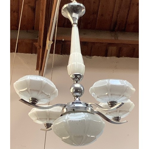 412 - A chromium and opaque white glass four-light chandelier