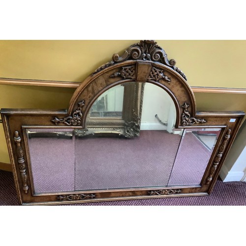 410 - A 19th century oak overmantle mirror, possibly previously the back to a sideboard, with central arch... 