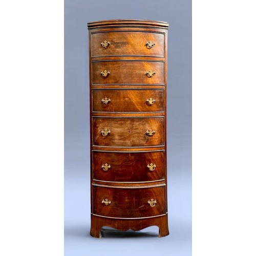 520 - A mahogany bow-fronted graduated six drawer tallboy, with brass handles, raised on shaped bracket fe... 