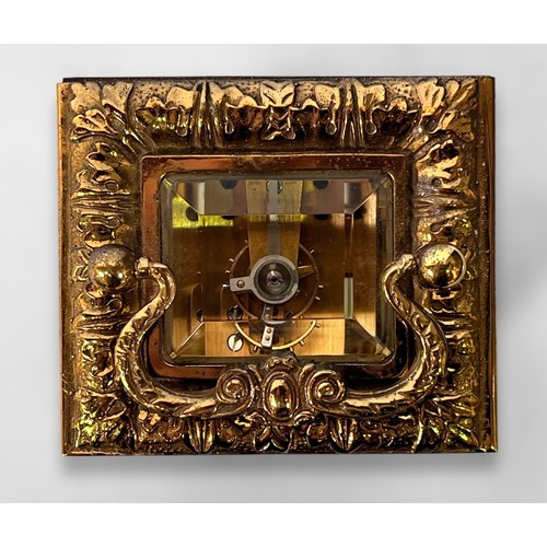 377 - An ornately decorated brass-cased carriage clock by Charles Frodsham & Co, London, cast caryatid pil... 